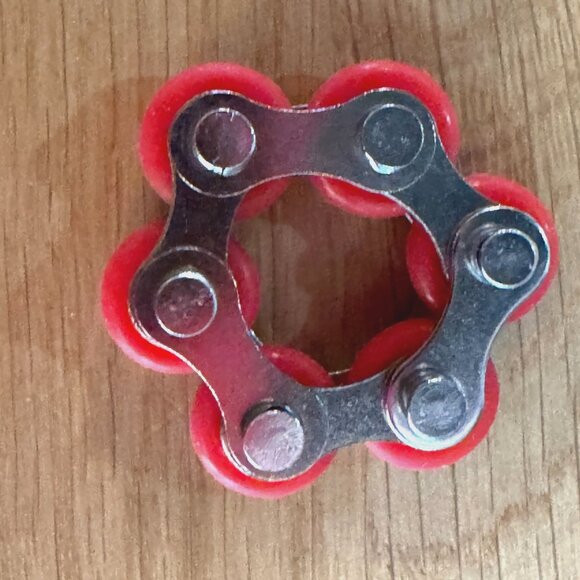 Fidget Toy: 4 Piece Flippy Roller Flick (Bike) Chain Fidget Toys with Case - Picture 7 of 16